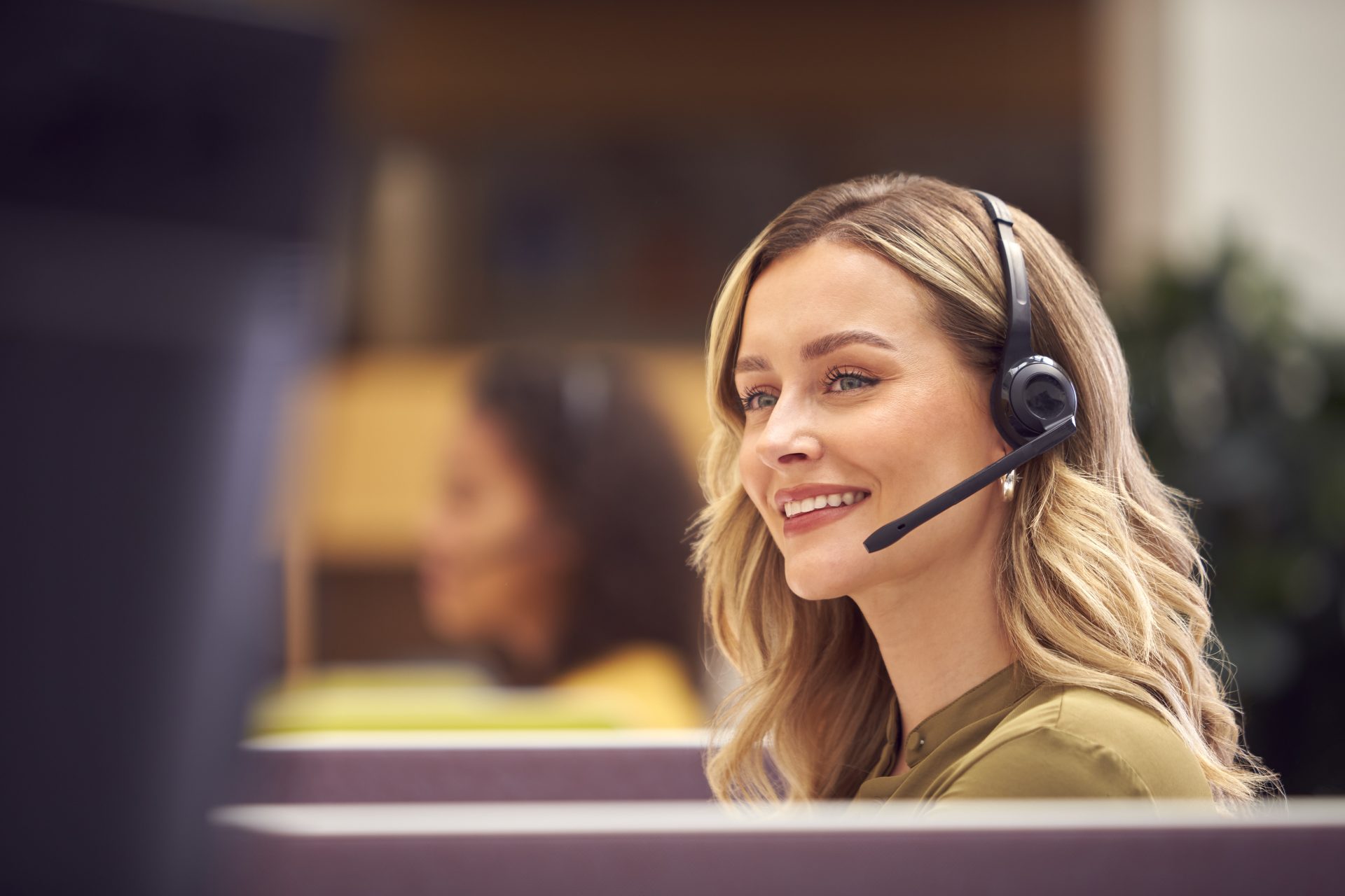 Businesswoman In Cubicle Wearing Headset Talking T 2021 12 09 06 51 13 Utc